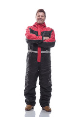 Fototapeta premium happy man in winter insulated overalls. isolated on a white