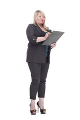 Mature woman taking notes in the clipboard .