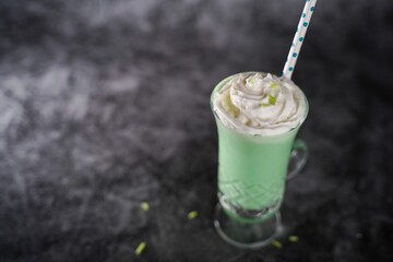 Shamrock shake - st patricks day drink, selective focus