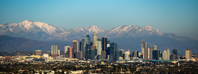 Down Town Los Angeles with snow capped mountains.