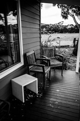 Black and white chairs on a deck