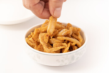 Fresh fried pork dregs on a pure white background