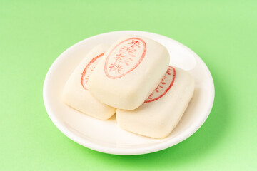 Jujube paste walnut cake with solid color background