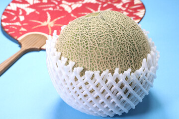 マスクメロンと団扇