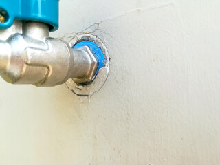 Defective faucet. Cause wastage of water or leaky faucet, Leaking water tap has drips along the joints.