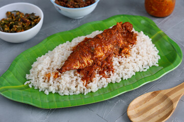 Spicy Mackerel fish curry and rice serving Kerala fish curry , Goan red fish curry , Indian fish curry gravy Bengali fish masala curry Kolkata, India Sri Lanka Lankan food