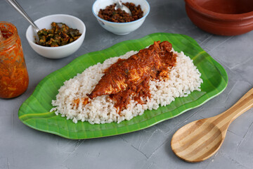 Spicy Mackerel fish curry and rice serving Kerala fish curry , Goan red fish curry , Indian fish curry gravy Bengali fish masala curry Kolkata, India Sri Lanka Lankan food