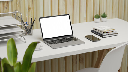 3D rendering, workspace with laptop, smartphone, office paper filing trays and supplies, 3D illustration