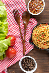 Delicious pasta with gravy and vegetables and seasonings.