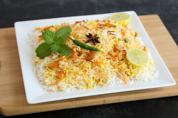 Vegetable biryani biriyani ,  Hyderabadi Shahi Pulao and raita Pilaf Basmati rice dish Indian spices Kerala India Sri Lanka Pakistan. Ghee rice, Lemon rice, boiled white rice