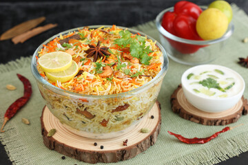 Vegetable biryani biriyani ,  Hyderabadi Shahi Pulao and raita Pilaf Basmati rice dish Indian spices Kerala India Sri Lanka Pakistan. Ghee rice, Lemon rice, boiled white rice