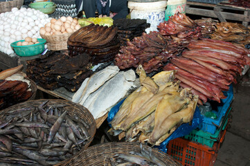 Display Of Dried Fish And Eggs At A Market Stall At A Local Market, Battambang, Cambodia