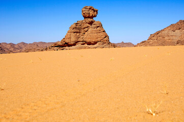Fototapeta na wymiar Eroded Rock Pyramide With Ball-shaped Tip, Acacus Mountains, Sahara Desert, Libya
