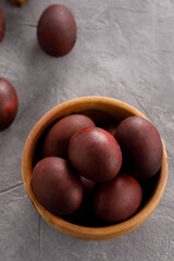 Still life many colorful easter eggs on a textural background. Rustic. Easter celebration concept.