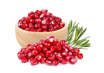 Pomegranate seeds in wood bowl on white background