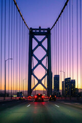 Driving over the San Francisco / Oakland Bay Bridge at Sunset.