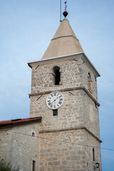 Fototapeta na wymiar The bell tower of the Parish Church of St. Filip i Jakov, Old town Grobnik