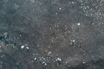 Texture of ice on the asphalt, close-up. Top view, copy space