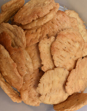 fried salted homemade  thattai  made of maida (bleached flour) .Also known as kaja