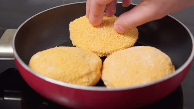 Preparation of frozen cordon bleu schnitzel. Homemade food. selective focus