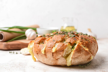 Fresh garlic bread on light background,closeup