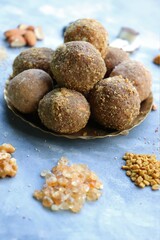 Gond and methi ke laddoo. Sweet Dink laddu is also known as Dinkache ladu in Marathi. Recipe ingredients such as fry fruits, Fenugreek seeds, Khaskhas, Edible gum, Garden Cress Seeds, sugar. 