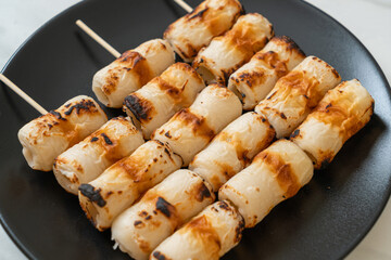 grilled tube shaped fish paste cake skewe or tube squid skewer