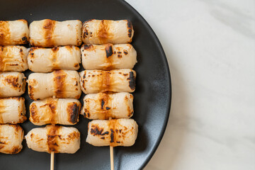 grilled tube shaped fish paste cake skewe or tube squid skewer