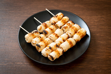 grilled tube shaped fish paste cake skewe or tube squid skewer