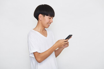 Young Asian man with a mobile phone