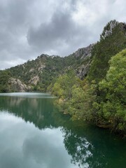 Colorful mountain landscape at Lake Aguas Negras, Sierra de Cazorla, Segura y las Villas, Andalucia, Spain - obrazy, fototapety, plakaty