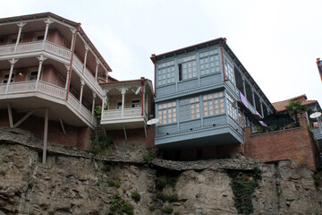 Georgian houses in the city of Tbilisi. Blue sky. Colored houses.