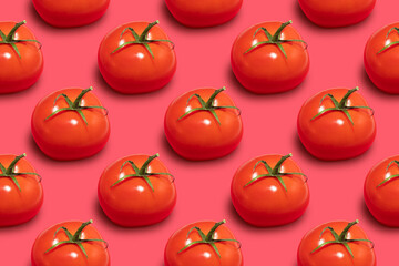 Pattern of ripe red tomatoes on a pink background