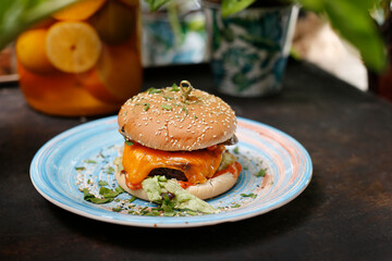 Vegetarian burger with chedar cheese and tofu
