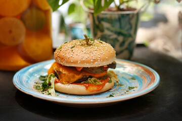 Vegetarian burger with chedar cheese and tofu
