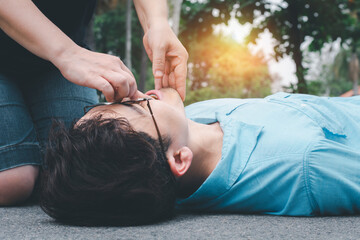 Rescue CPR training to safe life Emergency First Aid on A Man has an Accident and Lose...