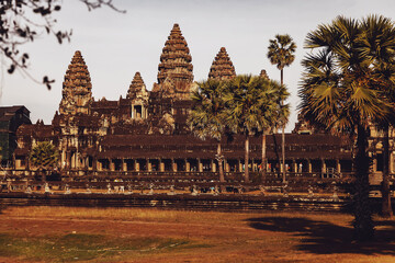 Stone ruins of Angkor Wat temple complex largest religious monument and UNESCO World Heritage Site. Ancient Khmer architecture with stone murals and sculptures. Amazing travel to Siem Reap, Cambodia