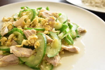Stir fried cucumber with pork and egg. Thai style food.