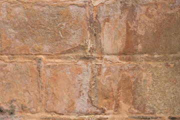 Textured background in the form of a brown old wall
