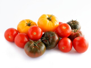 tree colours of tasty tomatoes close up