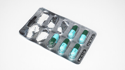 Aluminum  tablet for pill capsules. The medicine panel has been applied on a white background.