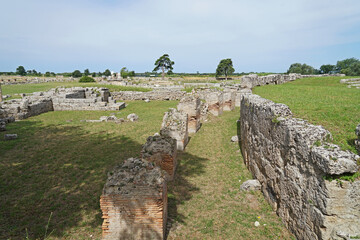 Paestum Archaeological Park with ruins of ancient greek city with temples, amphitheater, popular...