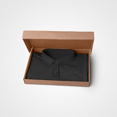 Presentation mockup of black textured polo, folded in a box, for design.