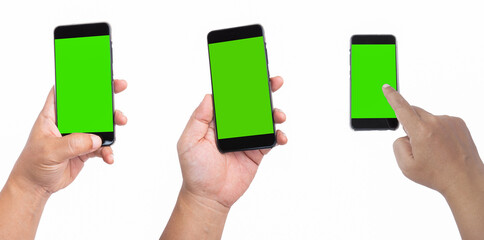 Obraz na płótnie Canvas A black smartphone with a green screen is held in the left hand. Place your phone on a white background and poke your index finger on the screen.