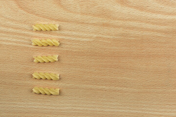 Pasta tag for listing baked goods on wooden background