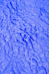 Water erosion on sandstone floors Abstract blue background