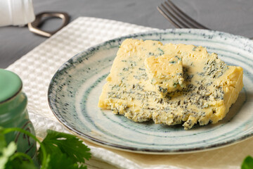 Close up of piece of blue cheese