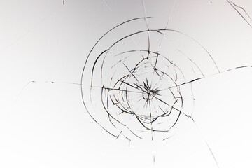 Cracks on the glass on a white background.