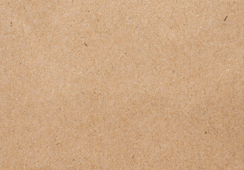Brown paper texture background of paperboard sheet.