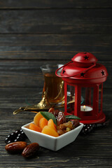 Concept of Ramadan with food and accessories on wooden table
